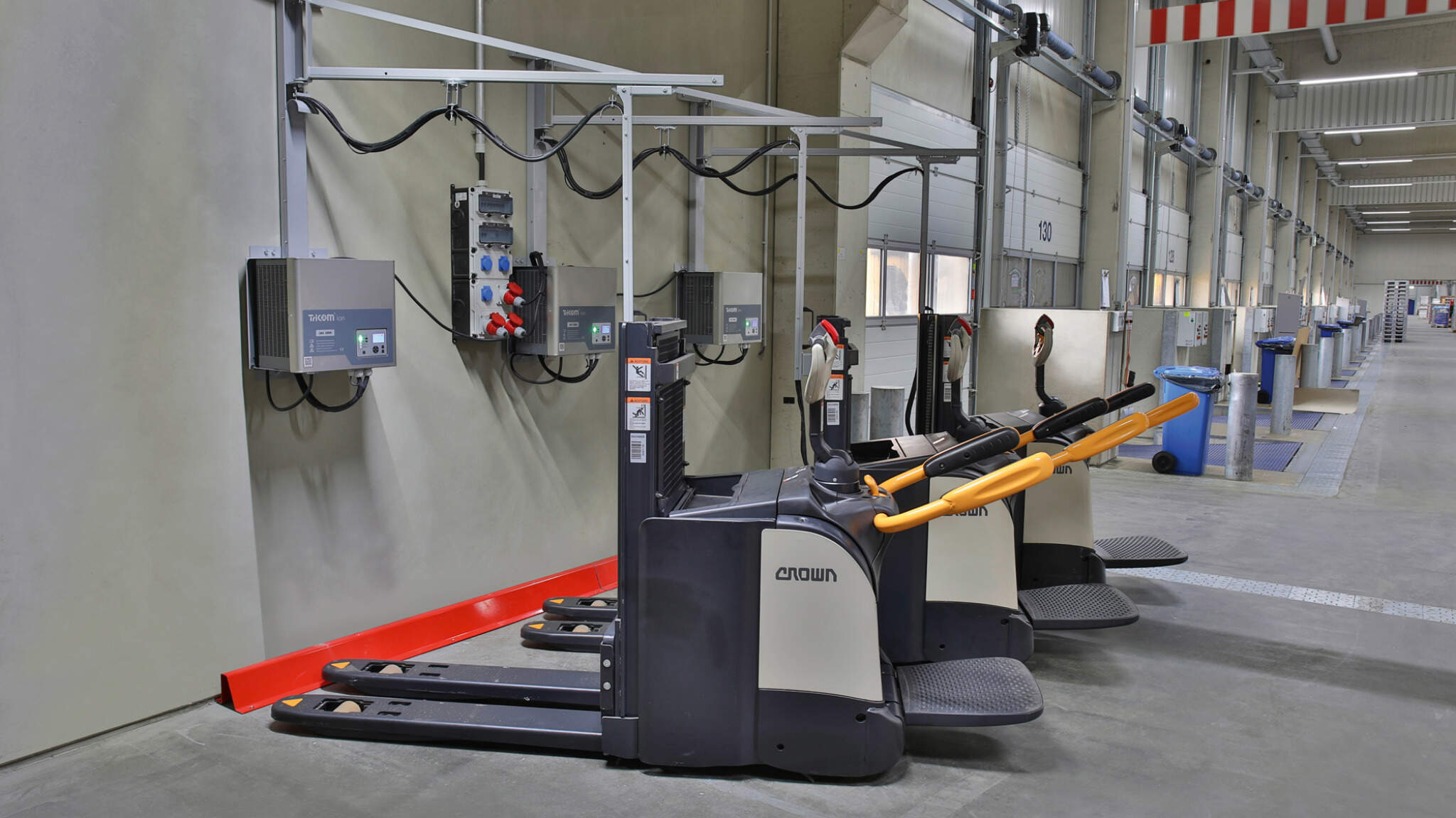 Li-Ion pallet trucks charging at DACHSER cross-dock warehouse